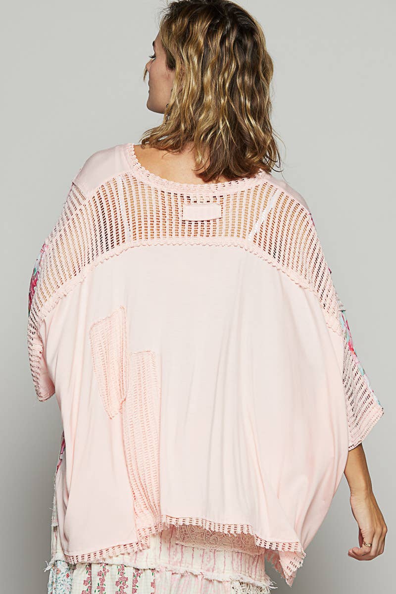 V-neck drop shoulder print fabric contrast knit top.